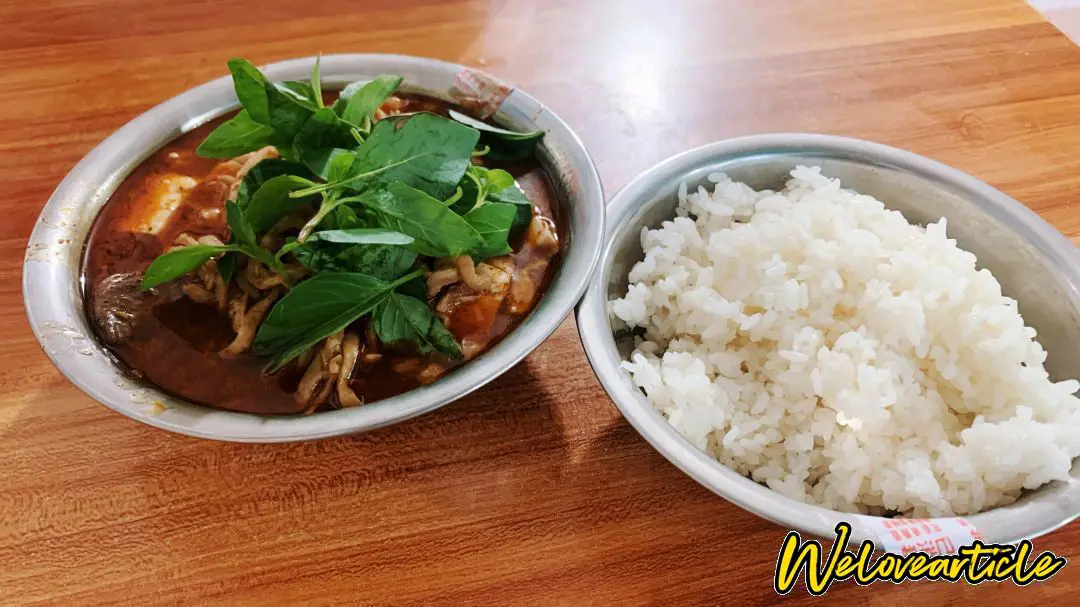 罗山大肠汤，好吃，和小时候吃的一样的味道，米饭口感一般,报晓新村门口杨记大肠汤